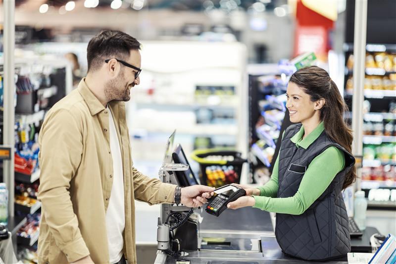 customer-paying-checkout-supermarket